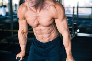 man doing dips bodyweight chest workout